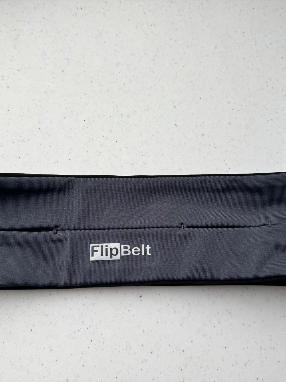 FlipBelt Women’s Running Belt — Carbon